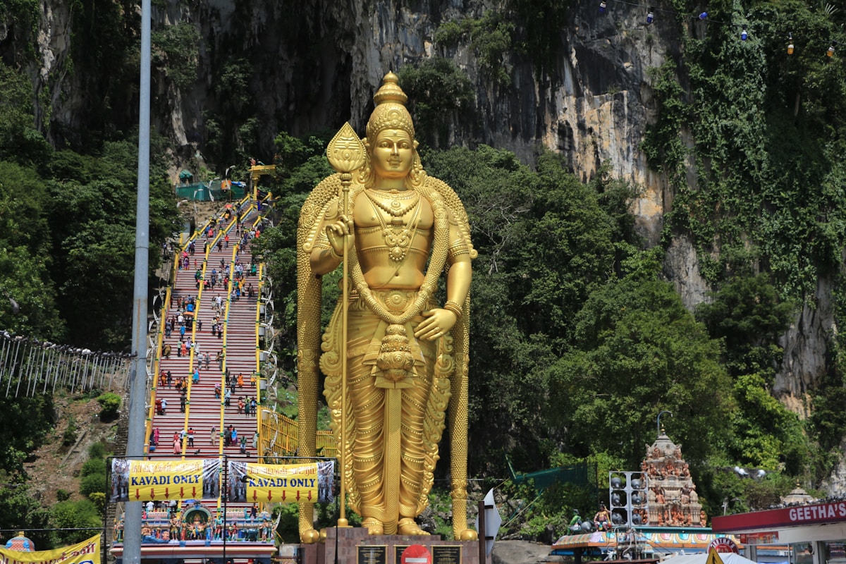 42.7-metre golden Murugan statue at the entrance to Batu Caves, Selangor, Malaysia