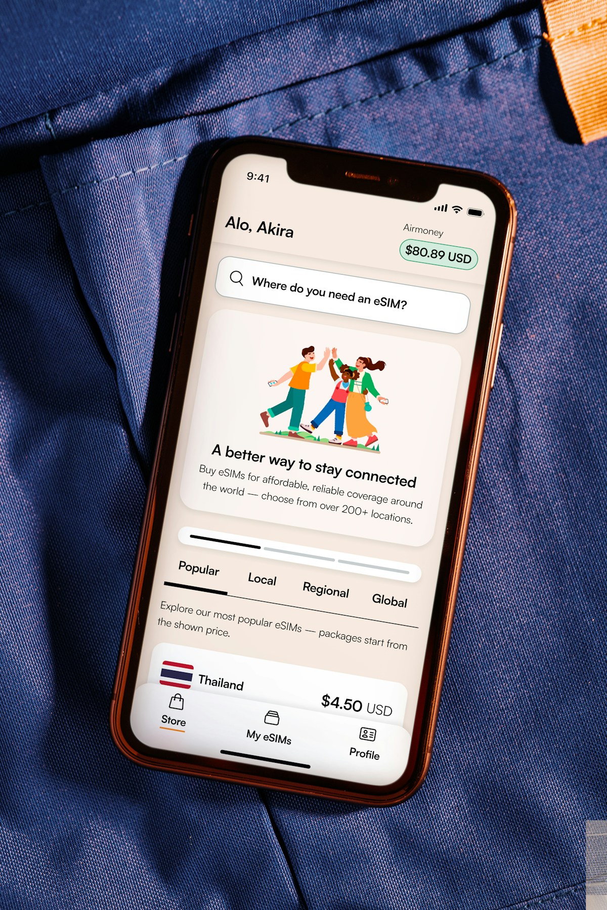 Smartphone displaying an eSIM app with plans and data packages for international travel