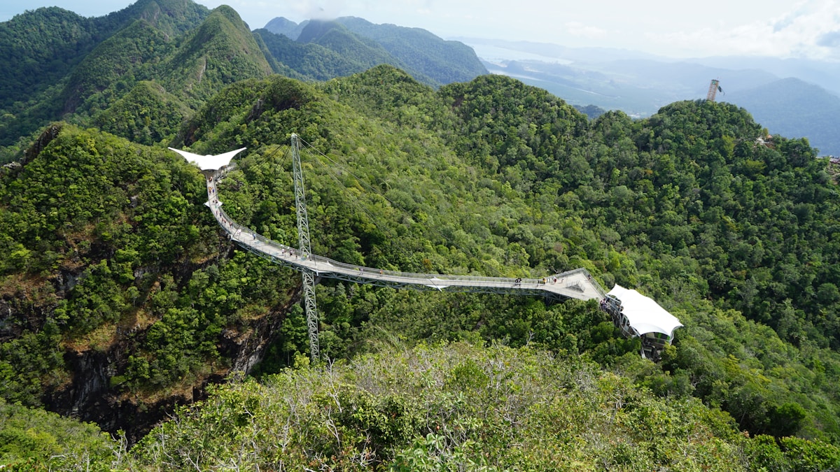 Langkawi Sky Bridge and cable car station above green jungle mountains