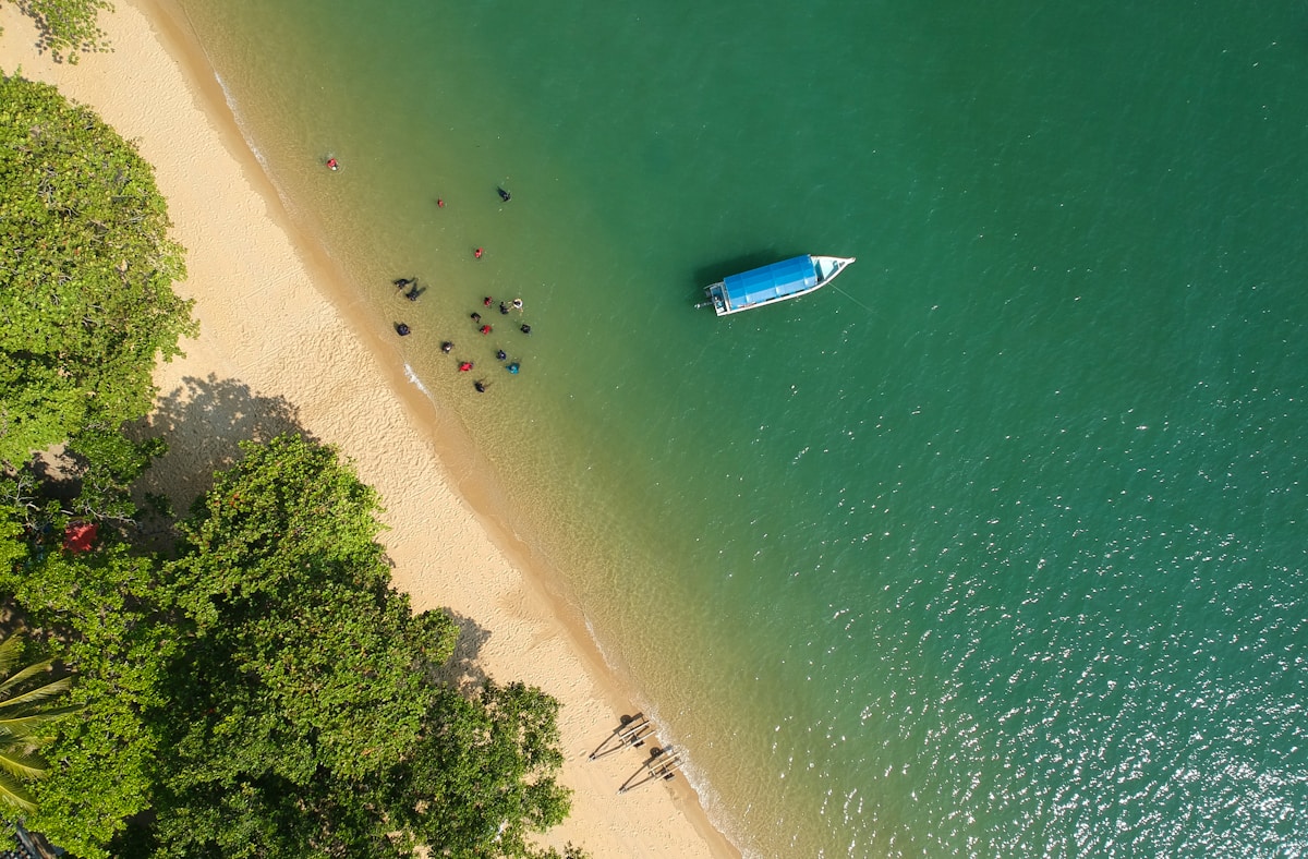 Blue wooden boat on calm water, Pangkor Island, Perak, Malaysia