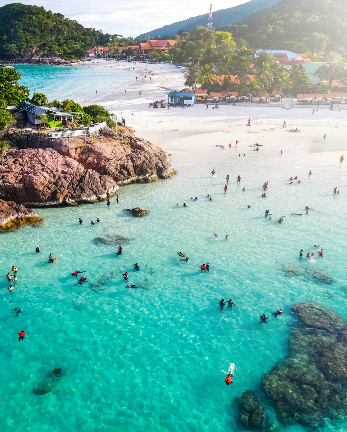 People on beach, Kuala Terengganu area, Malaysia