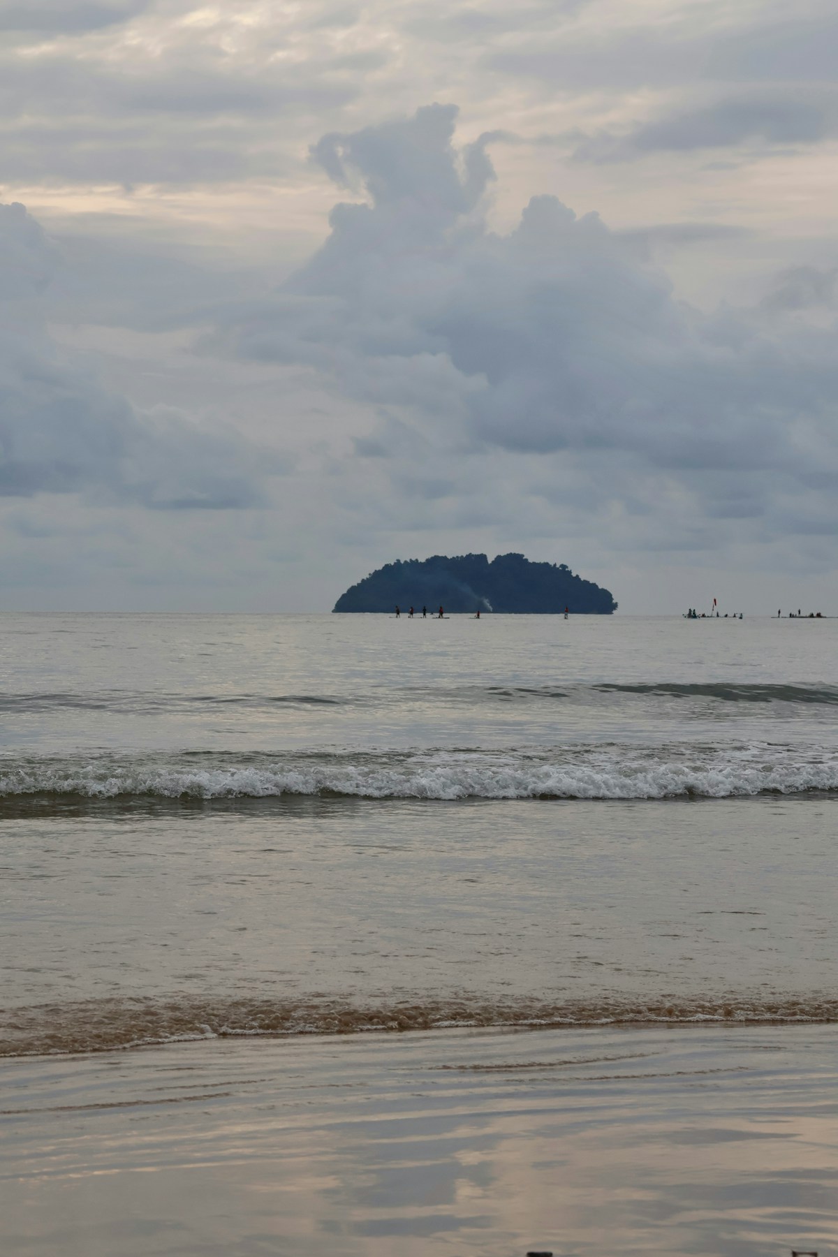 Island in the ocean under cloudy sky, Malaysia
