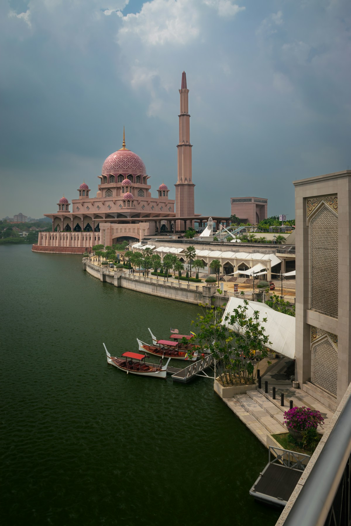Putra Mosque beside Putrajaya Lake on a cloudy day, Putrajaya, Malaysia